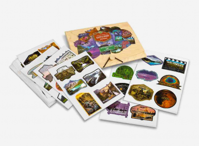 Explorer Stickers with the stickers sprawled out next to the packaging